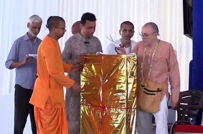 Hari-Sauri-Dasa-cuts-the-inaugural-ribbon-for-Chaitanya-Mahaprabhu-His-Life-and-Precepts-1536x1018